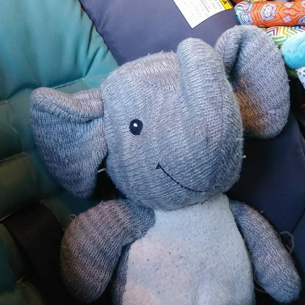 Adrian's Elephant in his and Peanut's car seat
