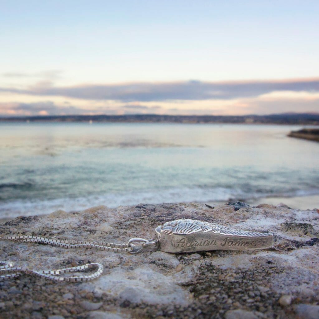 Adrian's necklace on the California coast at sunset (Miranda Hernandez)